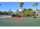 Community outdoor basketball court surrounded by lush landscaping and palm trees at 334 Sea Rim Ave, Las Vegas, NV 89148