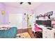 Charming bedroom with hardwood floors, workspace with dual monitors, and ample closet space at 334 Sea Rim Ave, Las Vegas, NV 89148