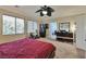 Comfortable bedroom with carpet flooring and an exercise bike at 334 Sea Rim Ave, Las Vegas, NV 89148