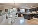 Bright kitchen with stainless steel appliances, granite countertops, and a cozy breakfast nook with backyard view at 334 Sea Rim Ave, Las Vegas, NV 89148
