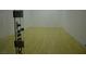 Empty racquetball court with light wood flooring with the word Court on the door in black letters at 334 Sea Rim Ave, Las Vegas, NV 89148