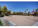 Sand volleyball court with net, court lines and landscaping at 334 Sea Rim Ave, Las Vegas, NV 89148