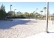 Community sand volleyball court with netting and lighting, great for outdoor recreation at 334 Sea Rim Ave, Las Vegas, NV 89148