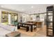 Modern kitchen with island, white cabinets, and stainless steel appliances at 425 Crown Mesa Ave, Las Vegas, NV 89138