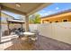 Covered patio with seating area and fire pit at 5444 White Barn Ct, North Las Vegas, NV 89081