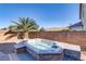 Relaxing hot tub with ample space and landscaping, perfect for unwinding outdoors at 5536 Valensole Ave, Las Vegas, NV 89141