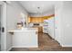 Kitchen features wood cabinets and white appliances at 5846 Golden Wing St, Las Vegas, NV 89113