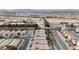 Aerial view of a residential neighborhood with surrounding industrial areas at 6054 Sierra Medina Ave, Las Vegas, NV 89139