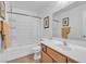 Clean bathroom with tub shower combo and wood vanity at 6054 Sierra Medina Ave, Las Vegas, NV 89139