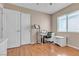 Bright bedroom with wood floors, and a workspace at 6054 Sierra Medina Ave, Las Vegas, NV 89139