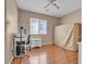 Bedroom with wood floors and workspace at 6054 Sierra Medina Ave, Las Vegas, NV 89139