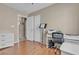 Bedroom with wood floors and home office at 6054 Sierra Medina Ave, Las Vegas, NV 89139