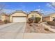 One-story home featuring a garage and well-maintained landscaping at 6054 Sierra Medina Ave, Las Vegas, NV 89139