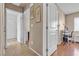 Light and airy hallway with tile floors and access to other rooms at 6054 Sierra Medina Ave, Las Vegas, NV 89139
