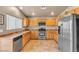 Modern kitchen, featuring stainless steel appliances and ample wood cabinets at 6054 Sierra Medina Ave, Las Vegas, NV 89139