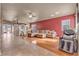 Open living room with hardwood floors and sectional sofa at 6054 Sierra Medina Ave, Las Vegas, NV 89139