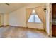 Living room with tile floors and a large window at 6105 Heather Mist Ln, Las Vegas, NV 89108