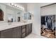 Spacious bathroom with double vanity and walk-in closet at 6521 Taffrail Ave, Las Vegas, NV 89118