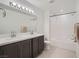 Clean bathroom with double vanity and bathtub at 6521 Taffrail Ave, Las Vegas, NV 89118