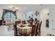 Elegant dining area adjacent to a cozy living room at 6521 Taffrail Ave, Las Vegas, NV 89118