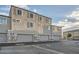 Rear view of townhouses with attached garages at 6521 Taffrail Ave, Las Vegas, NV 89118