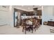 Modern kitchen with stainless steel appliances and dining area at 6521 Taffrail Ave, Las Vegas, NV 89118