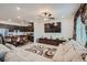 Open floor plan with kitchen, dining area, and living room at 6521 Taffrail Ave, Las Vegas, NV 89118
