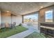 Private patio with artificial turf and outdoor furniture at 6521 Taffrail Ave, Las Vegas, NV 89118