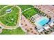 Aerial view of community pool, lawn, and playground at 759 Shadow Reef St, Henderson, NV 89011