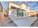 Spacious backyard with a large patio area at 7659 Dewy Falls Ave, Las Vegas, NV 89179