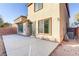 Home featuring concrete patio area and beige stucco exterior at 7659 Dewy Falls Ave, Las Vegas, NV 89179