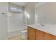 Bathroom featuring a vanity, toilet and shower-tub combination at 7659 Dewy Falls Ave, Las Vegas, NV 89179