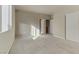 Spacious bedroom with neutral walls and carpet flooring at 7659 Dewy Falls Ave, Las Vegas, NV 89179