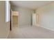 Spacious bedroom with neutral walls, carpet, and large closet at 7659 Dewy Falls Ave, Las Vegas, NV 89179