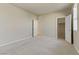 Bright bedroom featuring carpet and ample closet space at 7659 Dewy Falls Ave, Las Vegas, NV 89179