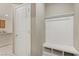 Hall tree near the front door with space for shoes and hooks for coats at 7659 Dewy Falls Ave, Las Vegas, NV 89179