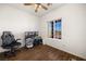 Home office featuring wood floors and a large window at 815 Cram Ave, Logandale, NV 89021