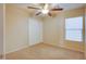 Bright bedroom with ceiling fan and double door closet at 9009 Careful Canvas Ave, Las Vegas, NV 89149
