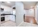 Modern kitchen featuring stainless steel appliances and white cabinets at 9009 Careful Canvas Ave, Las Vegas, NV 89149