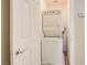 Stackable washer and dryer in dedicated closet at 9009 Careful Canvas Ave, Las Vegas, NV 89149