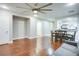 Open living area with hardwood floors and ceiling fan at 9009 Careful Canvas Ave, Las Vegas, NV 89149