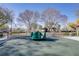 Community playground with a spinner at 9009 Careful Canvas Ave, Las Vegas, NV 89149