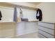 Large walk-in closet with double hanging rods and shelving at 9009 Careful Canvas Ave, Las Vegas, NV 89149