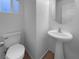 Clean bathroom with pedestal sink and toilet at 9133 Black Beauty St, Las Vegas, NV 89113
