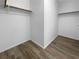 Large walk-in closet with double rods and flooring at 9133 Black Beauty St, Las Vegas, NV 89113