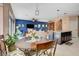 Kitchen breakfast nook with table and chairs, open to living room at 9417 Sand Tiger Ave, Las Vegas, NV 89148