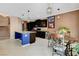 Open concept kitchen with island and breakfast nook area at 9417 Sand Tiger Ave, Las Vegas, NV 89148
