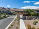 Image of the community entrance sign, featuring modern architecture and landscaping at 10271 Meridian Hill Ave, Las Vegas, NV 89135