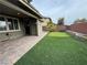 Spacious backyard with putting green and patio at 10273 Aragon Crown Rd, Las Vegas, NV 89135