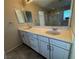 Double vanity with quartz countertops in main bathroom at 10273 Aragon Crown Rd, Las Vegas, NV 89135